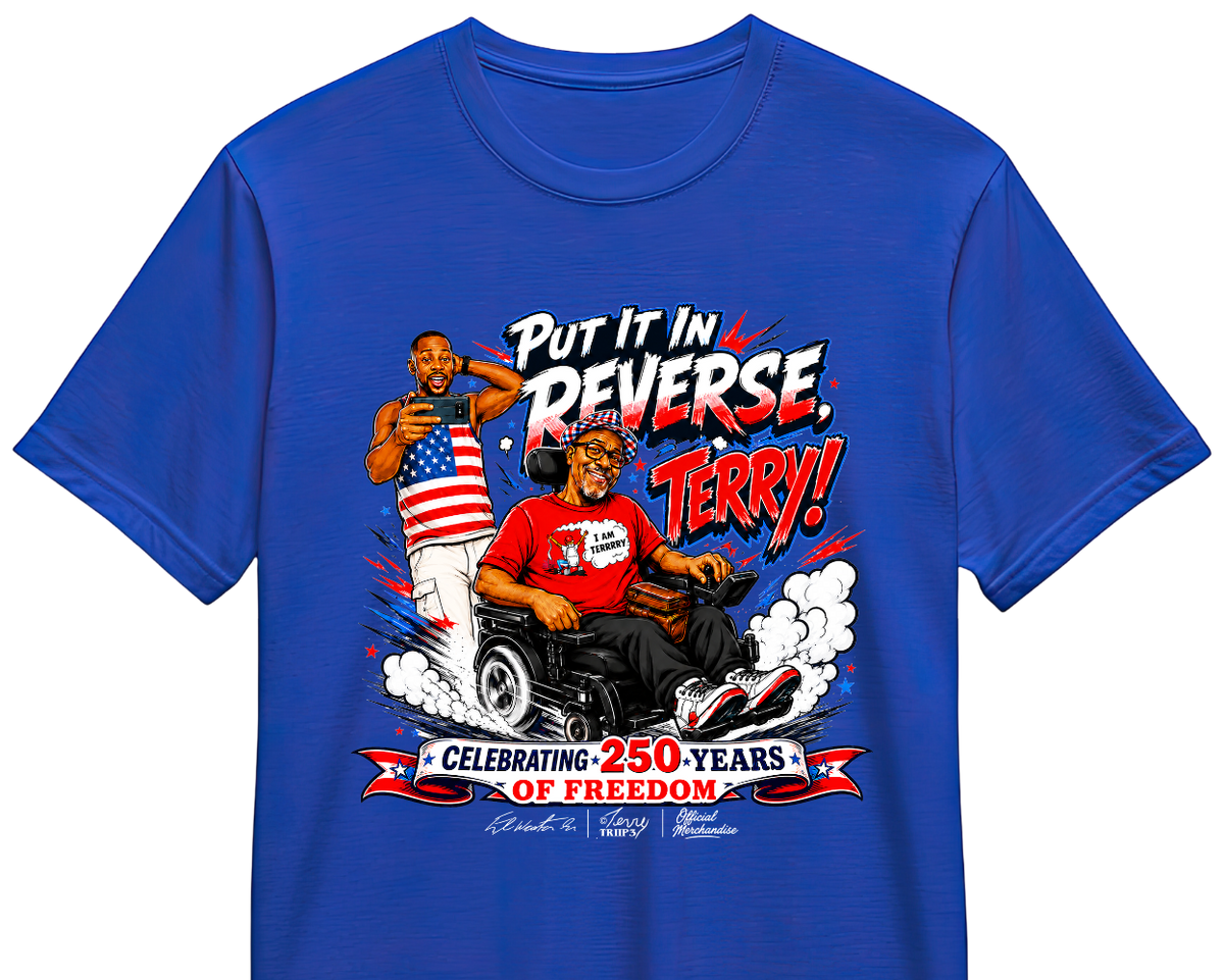 A royal blue short-sleeve t-shirt with a detailed graphic print on the front. The graphic features a stylized illustration of a man in a wheelchair with an American flag and a red shirt, accompanied by text that reads 'Put It In REVERSE, with TERRY!' and 'CELEBRATING 250 YEARS OF FREEDOM'.