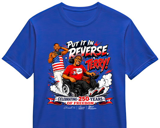 A royal blue short-sleeve t-shirt with a detailed graphic print on the front. The graphic features a stylized illustration of a man in a wheelchair with an American flag and a red shirt, accompanied by text that reads 'Put It In REVERSE, with TERRY!' and 'CELEBRATING 250 YEARS OF FREEDOM'.